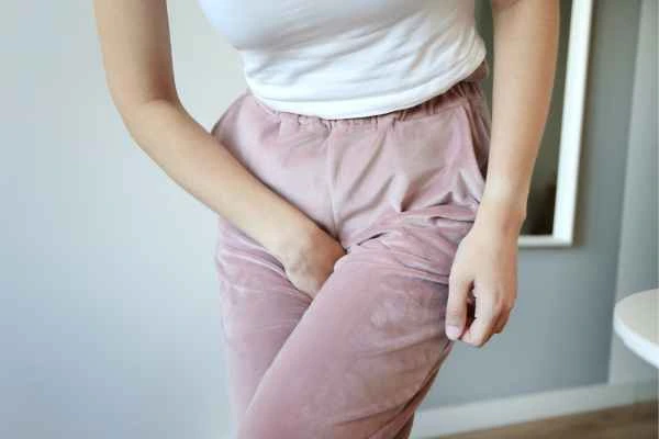 woman running for the toilet because of urinary incontinence Kentish Town